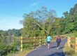 Two people walk down the Appomattox River trail in Colonial Heights